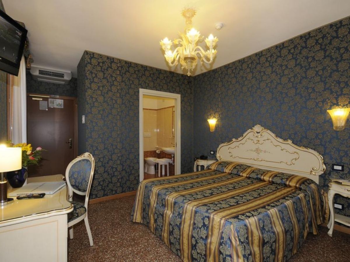 Hotel Il Mercante di Veneziaホテルのベッドルーム